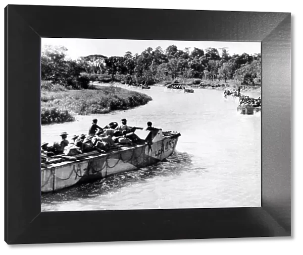 WW2 RIN landing craft carry Indian January 1945 soldiers along a tributary near