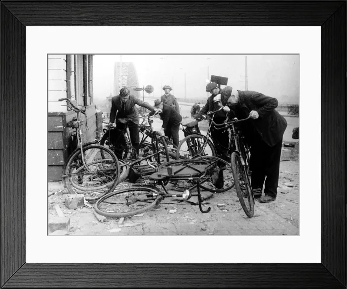 Framed Print : Dutch civilians select bikes left by German soldiers at the end of the Waal Bridge Framed Print : Dutch civilians select bikes left by German soldiers at the end of the Waal Bridge