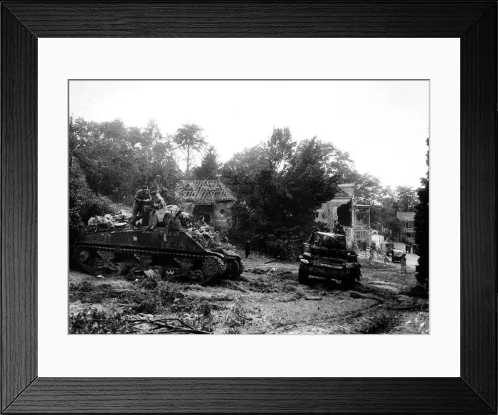 Framed Print : The first British regiment into Germany. Honey Reece tanks arriving with burnt out