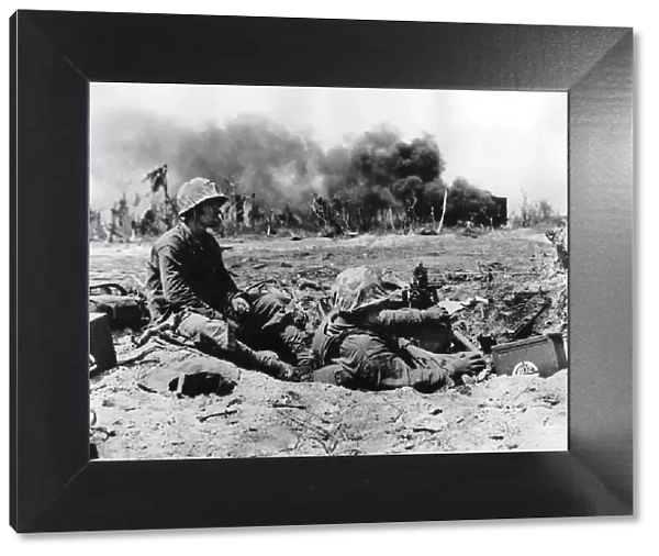 WW2 US marines on Namur Island 1944 Two marines relax in a machine gun nest