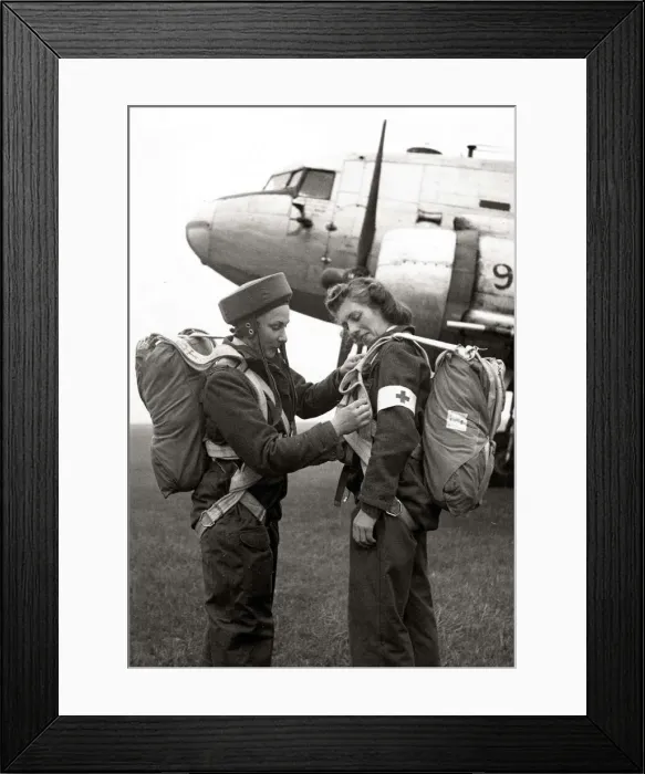 Framed Print : Two members of the Flying Sisters, a new airborne British nursing unit prepare their