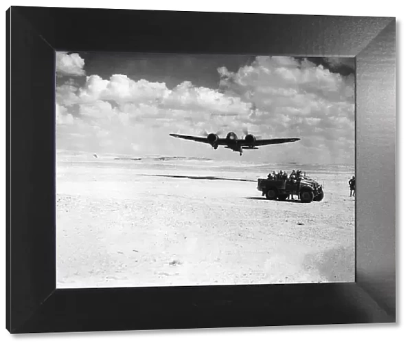 RAF Middle East Command planeover fliesa British desert patrol in Egypt. Circa 1942