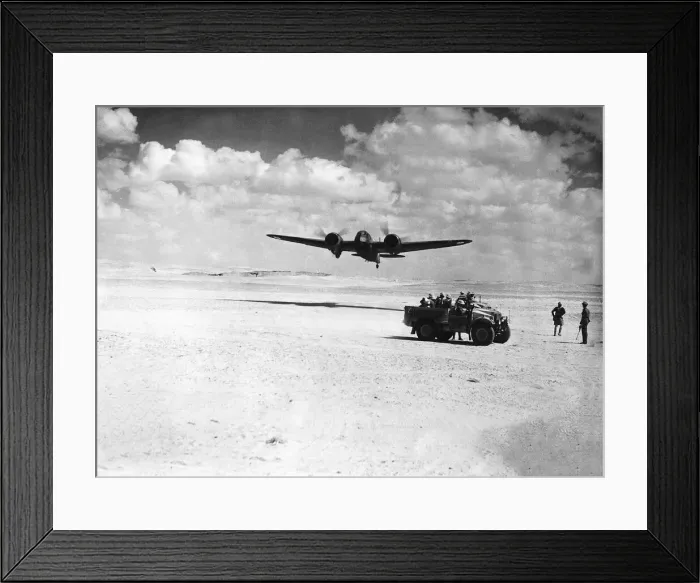 Framed Print : RAF Middle East Command planeover fliesa British desert patrol in Egypt. Circa 1942 Framed Print : RAF Middle East Command planeover fliesa British desert patrol in Egypt. Circa 1942