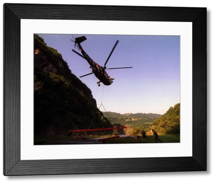 Framed Print : Building bridges in Bosnia Royal Engineers work on a footbridge near Spivo using a Framed Print : Building bridges in Bosnia Royal Engineers work on a footbridge near Spivo using a