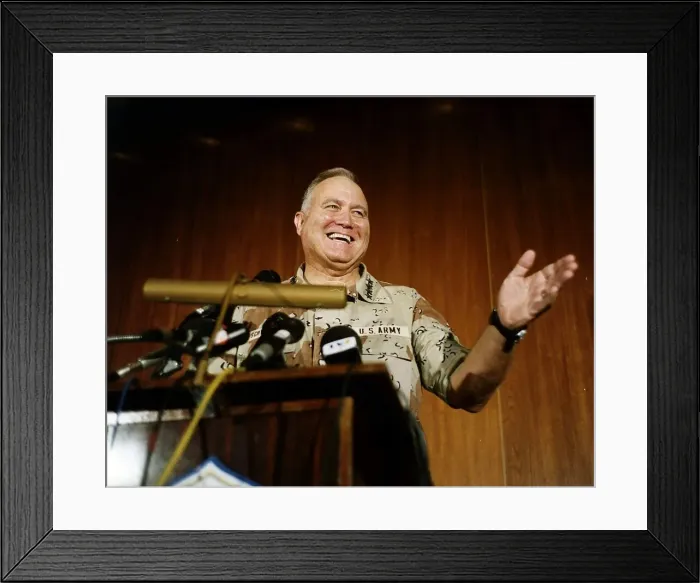 Framed Print : U. S. Army General Norman Schwarzkopf makes a statement as he talks at the podium Framed Print : U. S. Army General Norman Schwarzkopf makes a statement as he talks at the podium