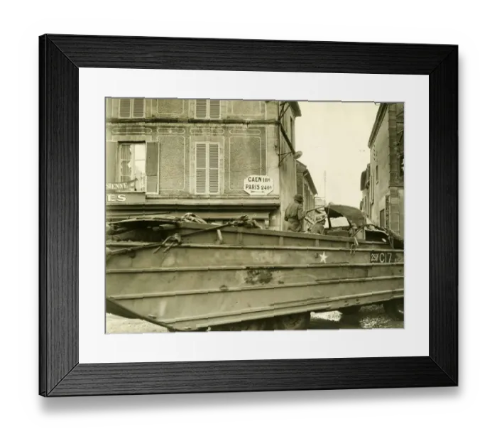 Framed Print : World War II Invasion of France D-Day + 8 A British army DUKW passes through