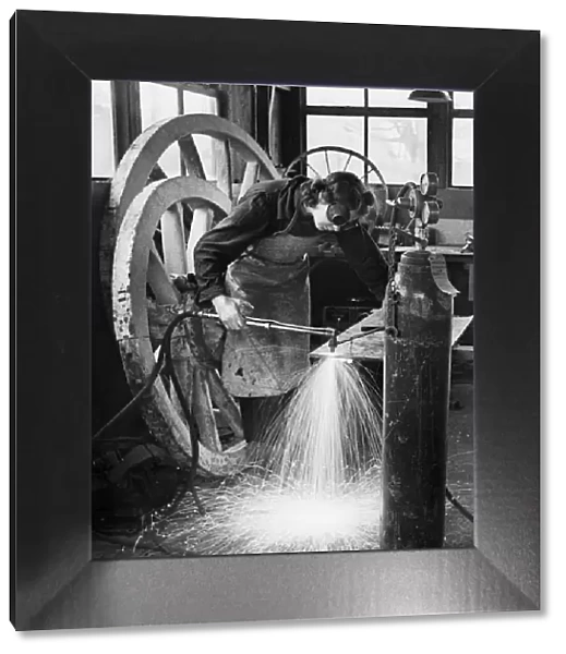 World War Two, Grace Shults at a welding smiths work assembling farm wagons at Great