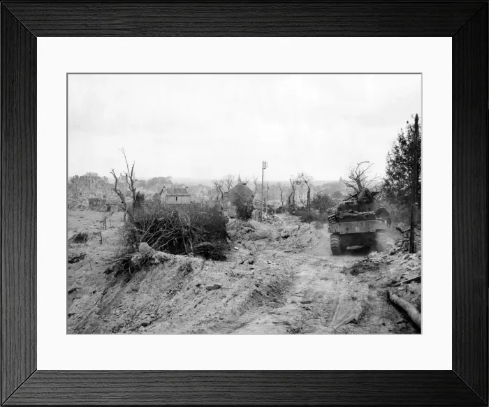 Framed Print : World War II Invasion of France A British army Sherman tank moves along Framed Print : World War II Invasion of France A British army Sherman tank moves along