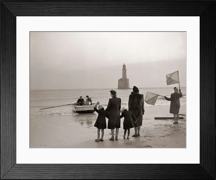 Framed Print : The families of the Rattray Head lighthouse keepers semaphore their loved ones as Old Framed Print : The families of the Rattray Head lighthouse keepers semaphore their loved ones as Old