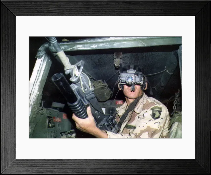Framed Print : An American soldier looking through a night vision scope Framed Print : An American soldier looking through a night vision scope