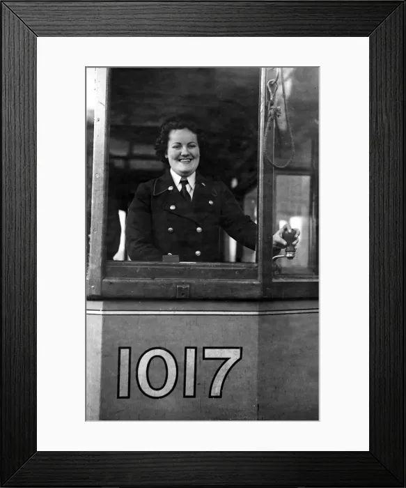 Framed Print : World War Two. One of the first women tramcar drivers to start work in Glasgow November