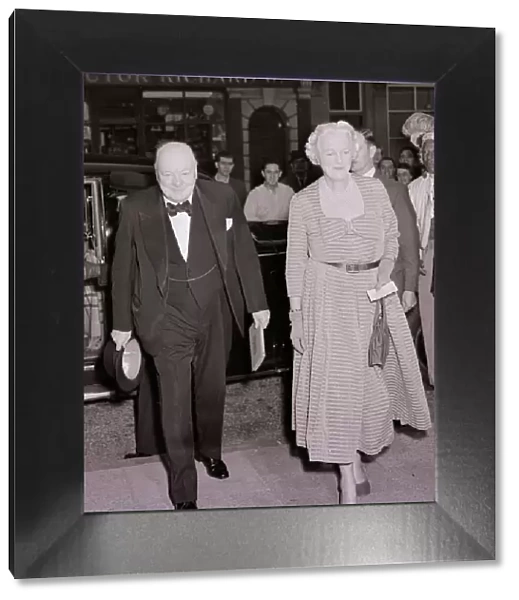 Sir Winston Churchill seen here arriving at the Scala Theatre with his wife. August 1952