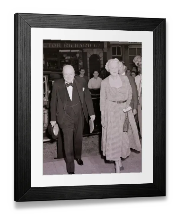 Framed Print : Sir Winston Churchill seen here arriving at the Scala Theatre with his wife. August 1952 Framed Print : Sir Winston Churchill seen here arriving at the Scala Theatre with his wife. August 1952