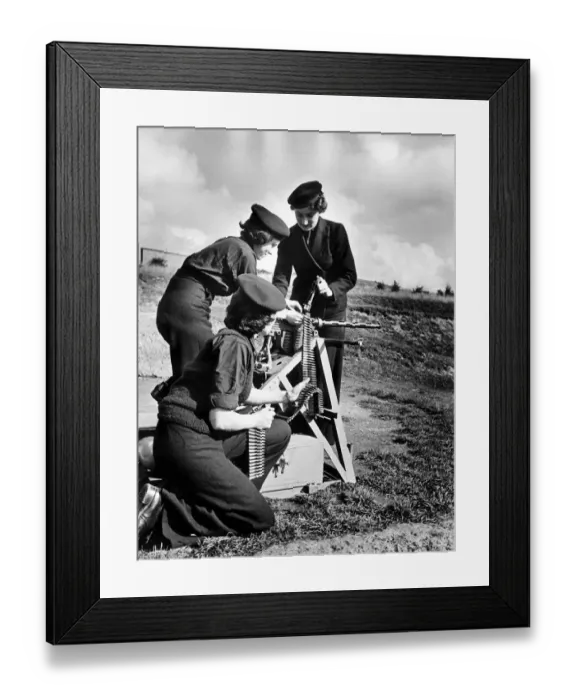 Framed Print : There are now wrens as Armourers and Picture shows them at work on Turret Gun before they Framed Print : There are now wrens as Armourers and Picture shows them at work on Turret Gun before they