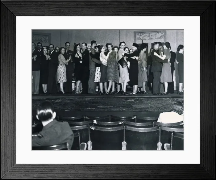 Framed Print : Men and women try to forget the war for a few hours seen here dancing on the stage of Framed Print : Men and women try to forget the war for a few hours seen here dancing on the stage of