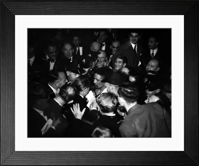 Framed Print : Randolph Turpin makes his way to the dressing room through the crowds after his fight