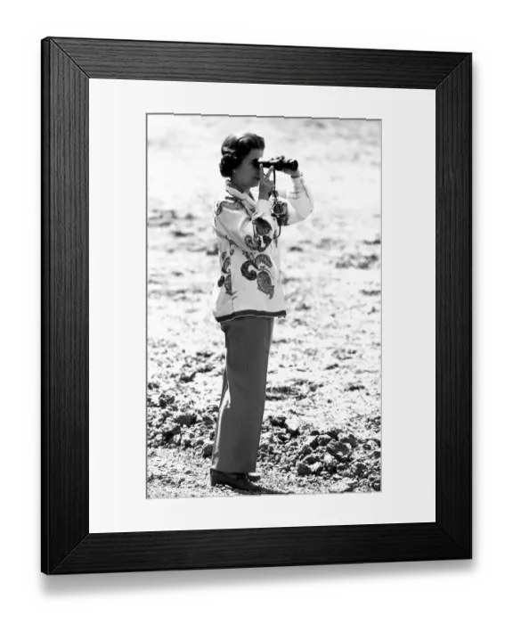 Framed Print : Queen Elizabeth II, 1979 The Queen looking through a pair of binoculars Framed Print : Queen Elizabeth II, 1979 The Queen looking through a pair of binoculars