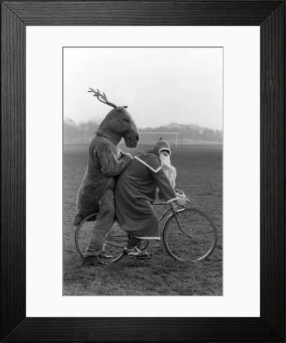 Framed Print : Father Christmas and Rudolf the Reindeer - bike stunt