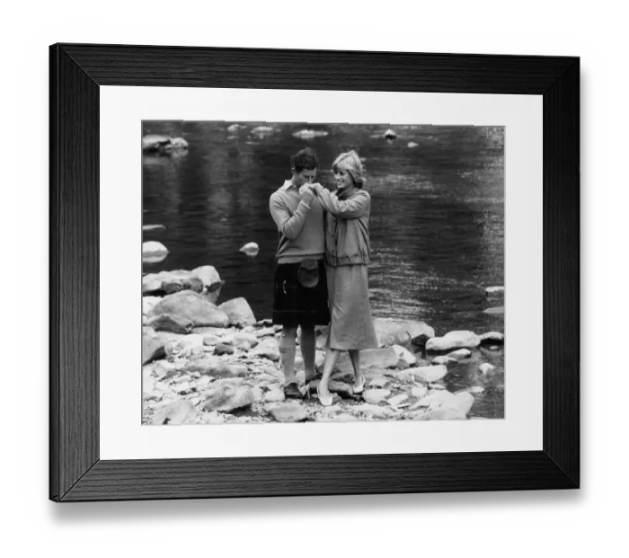 Framed Print : Prince Charles kissing the hand of Princess Diana while on Honeymoon at Balmoral Scotland Framed Print : Prince Charles kissing the hand of Princess Diana while on Honeymoon at Balmoral Scotland
