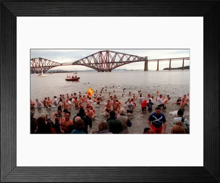Framed Print : Traditional New year dip January 1999 in the waters off South Queensferry