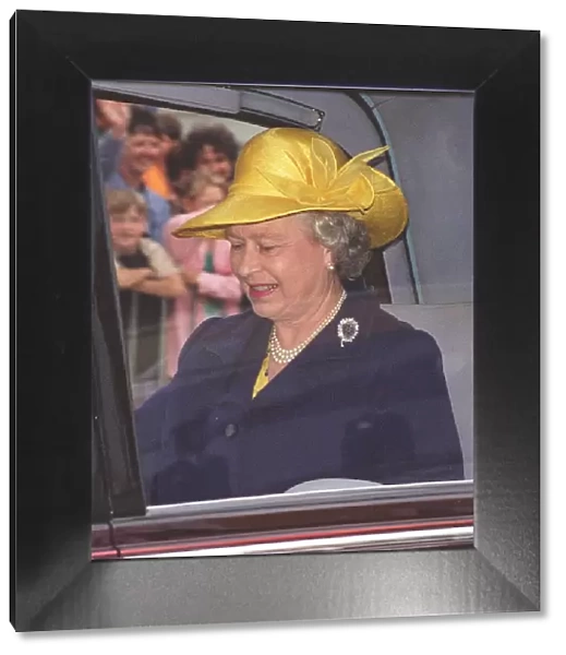 Queen Elizabeth II leaves Britannia, Aberdeen, in Daimler car. 17th August 1997