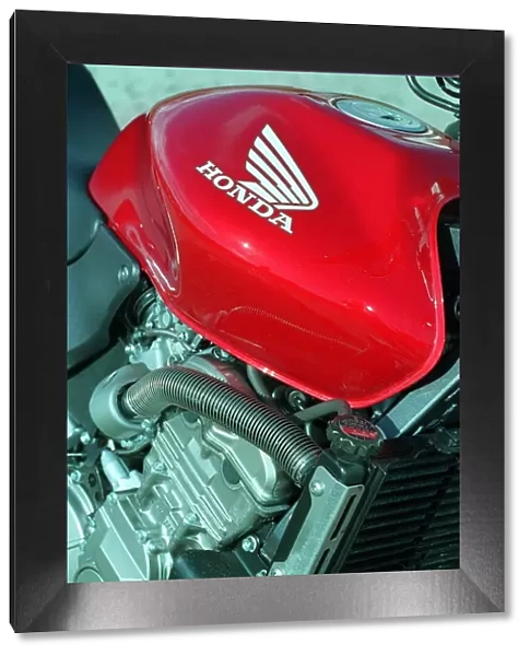 The Honda Hornet 600CC Motorbike April 1998 Fuel Tank badge and engine