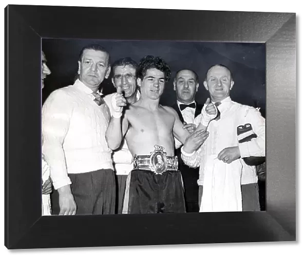 Peter Keenan, boxer, with Lonsdale belt. Firhill. 1957