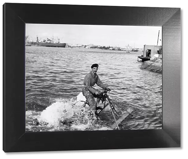 Suez Crisis 1956 Liet John Young crossing Port Said harbour on a pedal bike raft
