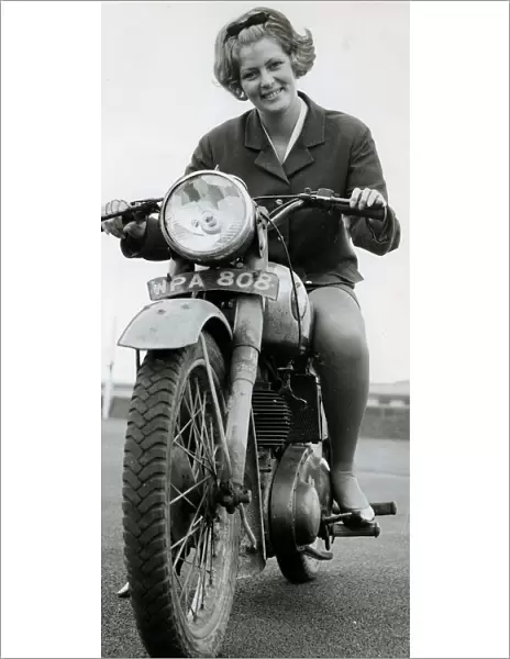 Jean Bruinsma travels to work every day on motorbike September 1967