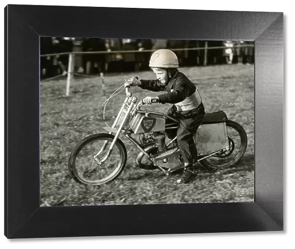 Kenneth McGuire aged 8 years old May 1950 Mascot of Perth Motor Club riding his