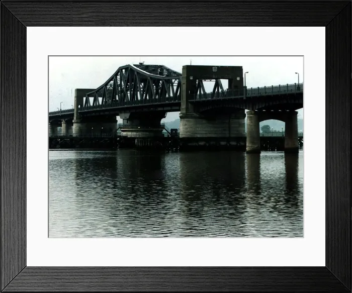 Framed Print : Kincardine Bridge showing signs of sinking in the mud flats river