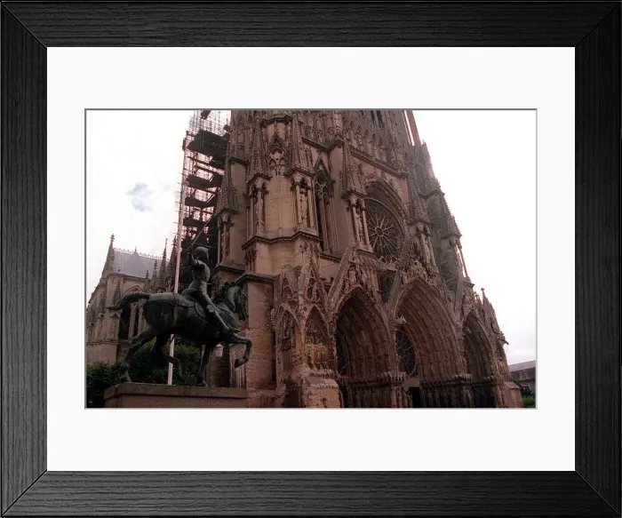 Framed Print : Joan of Arc statue looking up at the Cathedral at Reims Rheims France