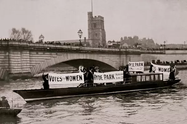 April 1908 Suffragettes launch boat at Putney Bridge London with notices announcing