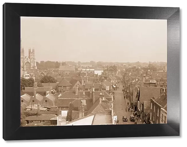 Canterbury Cathedral dominates the town. Our picture shows the high street with early