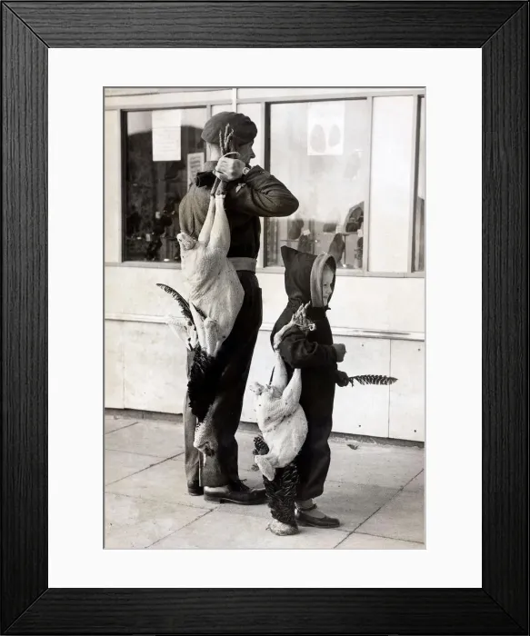 Framed Print : Paratrooper Robert Frost just back from Italy goes shopping with a little friend Framed Print : Paratrooper Robert Frost just back from Italy goes shopping with a little friend