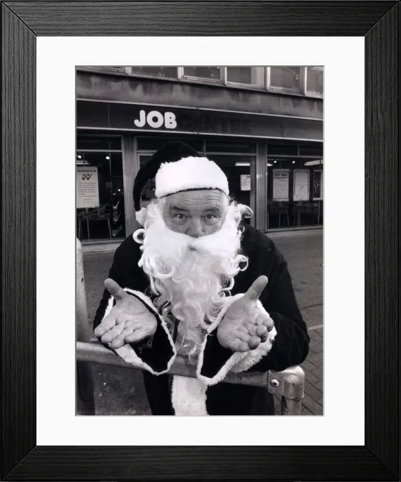 Framed Print : Father Christmas outside the Job centre circa 1980s Framed Print : Father Christmas outside the Job centre circa 1980s