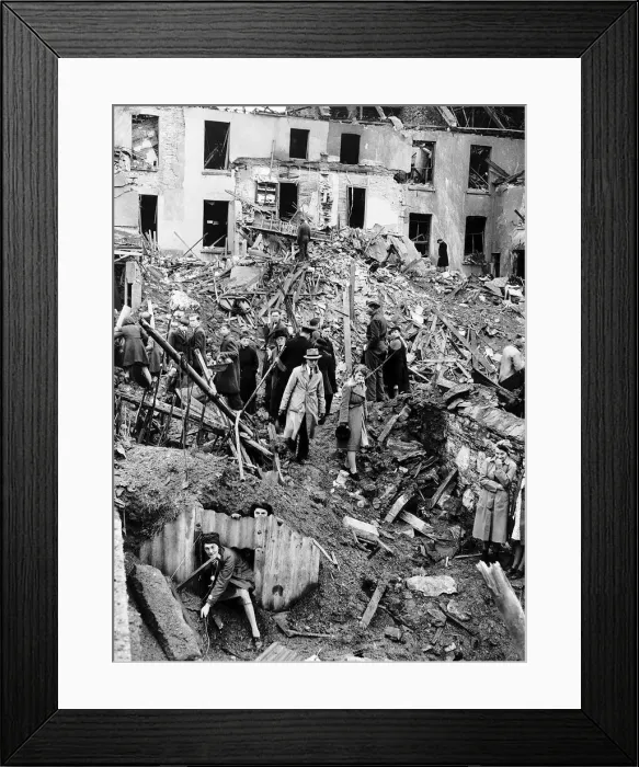 Framed Print : Plymouth schoolchildren and teachers examine the remains of their school after WW2 air
