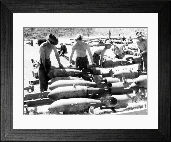 Framed Print : RAF ground crew in Burma loading 250lb bombs on to loading trolleys at an advanced Framed Print : RAF ground crew in Burma loading 250lb bombs on to loading trolleys at an advanced