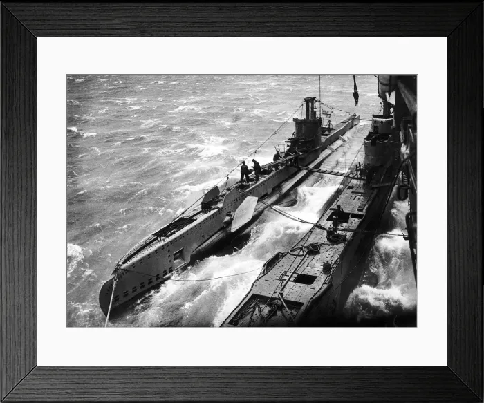 Framed Print : Two British submarines tied up to a supply ship prepare for another patrol during WW2 Framed Print : Two British submarines tied up to a supply ship prepare for another patrol during WW2
