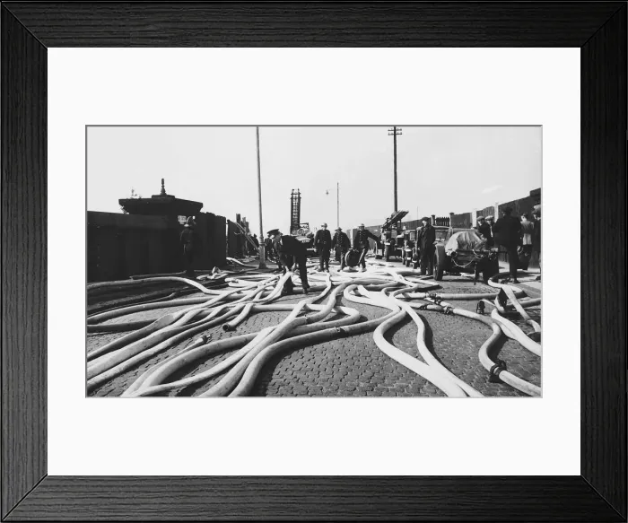 Framed Print : Walinden Road Hackney London as firemen fight a timber yard fire after WW2 air raid Framed Print : Walinden Road Hackney London as firemen fight a timber yard fire after WW2 air raid