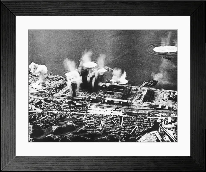 Framed Print : Allied bombs explode on dockside at Fuge Honshu Japan during a WW2 air raid - 1945