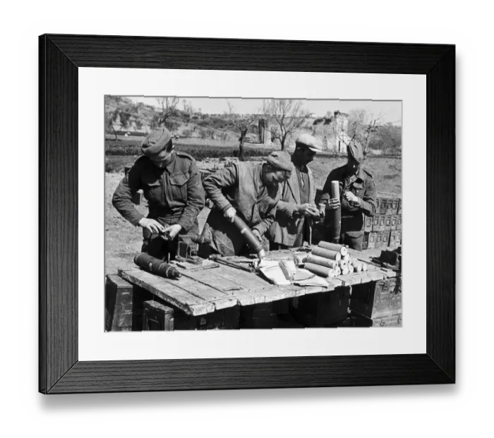 Framed Print : British troops filling shells with propaganda leaflets which are fired at enemy Framed Print : British troops filling shells with propaganda leaflets which are fired at enemy