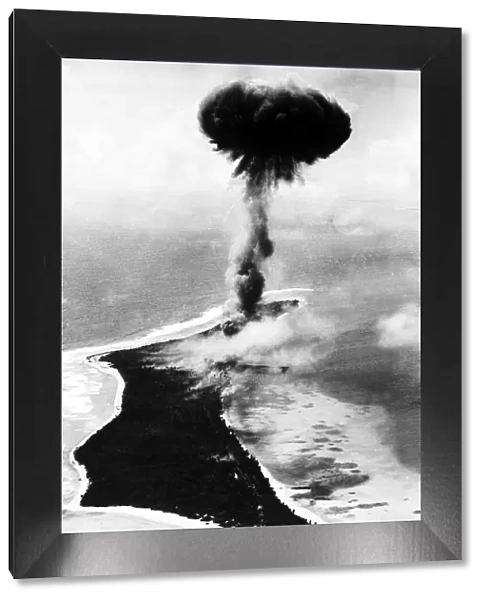 Mushroom cloud rises from Japanese ammunition dump on Kwajalein Atoll in