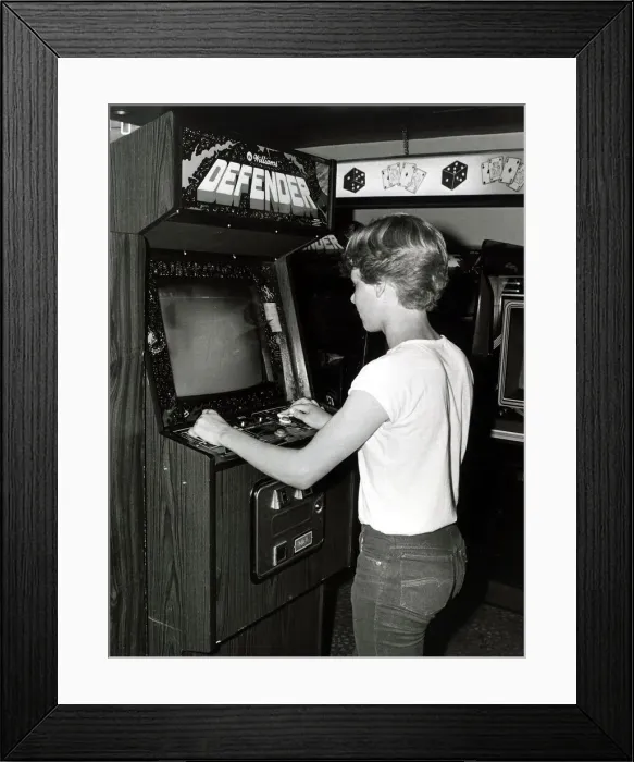 Framed Print : Teenager playing arcades - July 1983 14 year old Ian Pollard in Amusement Arcade in Framed Print : Teenager playing arcades - July 1983 14 year old Ian Pollard in Amusement Arcade in