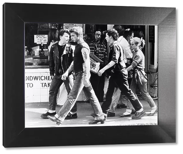 Youth Teddy Boys marching up the Kings Road in London. 30th July 1977