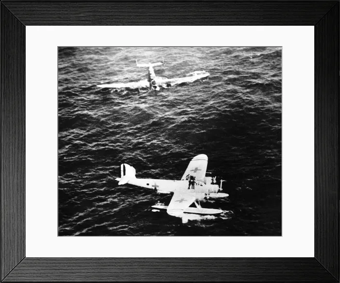 Framed Print : The crew of an air sea rescue seaplane picks up survivors from an Italian bomber shot