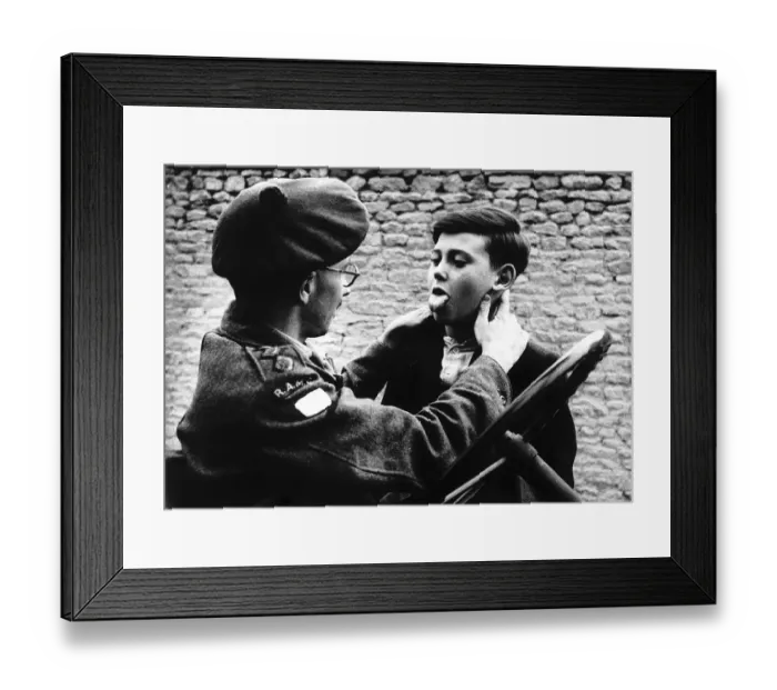 Framed Print : A South African medical officer in his off duty time acts as a village doctor to Framed Print : A South African medical officer in his off duty time acts as a village doctor to