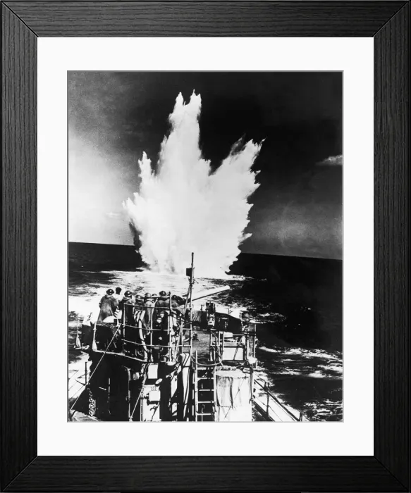 Framed Print : A Royal Navy ship drops depth charges on a German U Boat during WW2 1942 1940s Framed Print : A Royal Navy ship drops depth charges on a German U Boat during WW2 1942 1940s