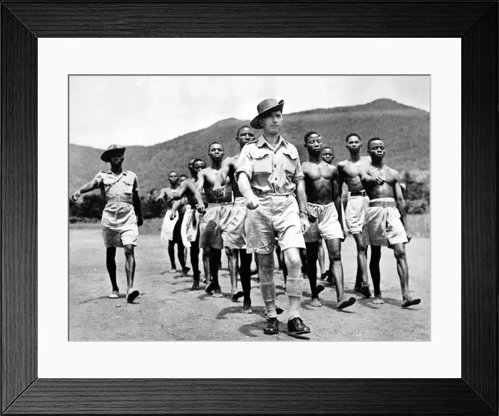 Framed Print : Sergeant George Thomas R. A. F. leading West African Air Corps recruits on a training march Framed Print : Sergeant George Thomas R. A. F. leading West African Air Corps recruits on a training march