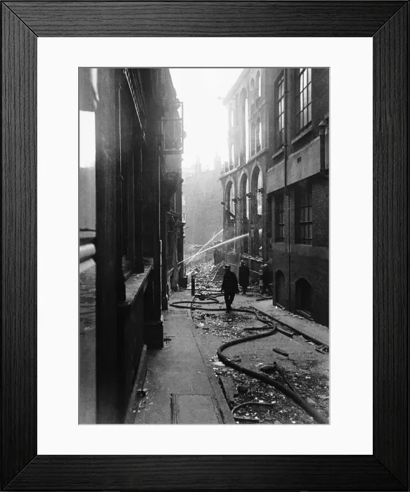 Framed Print : Firemen damp down a fire in Half Lane, City of London, after WW2 air raid Framed Print : Firemen damp down a fire in Half Lane, City of London, after WW2 air raid